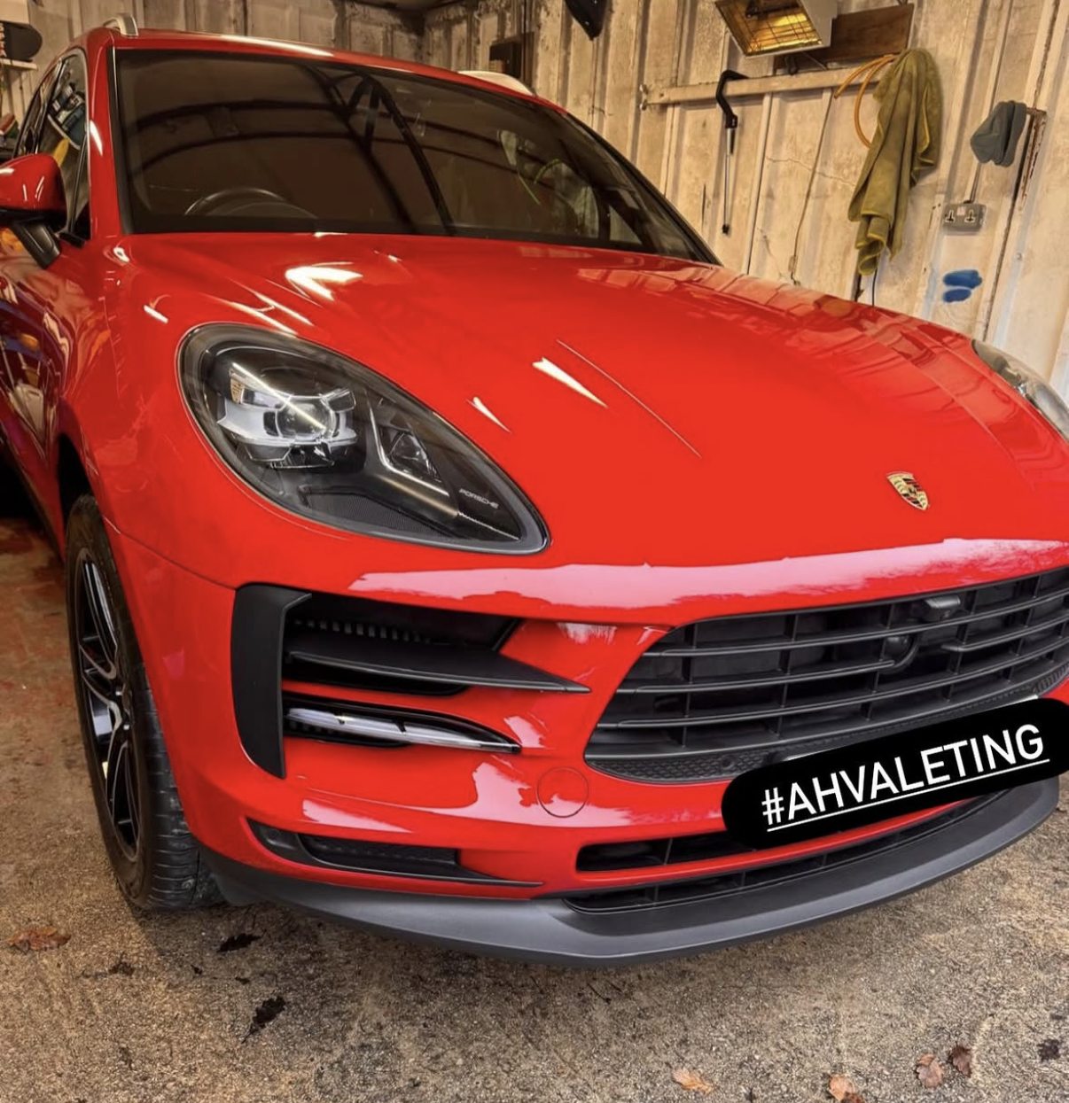 Red Porsche Macan after a ceramic coating